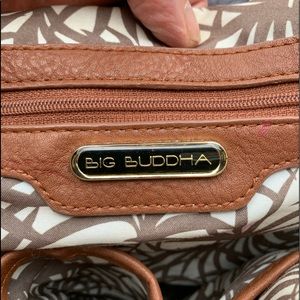 Ladies Big Buddha purses.